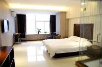 Luoyang Jiaxuan Theme Hotel (Longmen High-speed Railway Station Baolong Plaza)