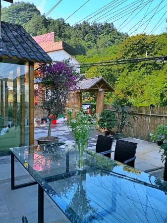 Zhangjiajie Jijianshan She Отели рядом с достопримечательностью «Dayangba Square»