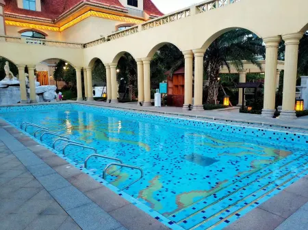 Dongman You + Hot Spring Holiday Apartment (Hengda Quandu) Отели рядом с достопримечательностью «Evergrande Five Nations Hot Spring Town»