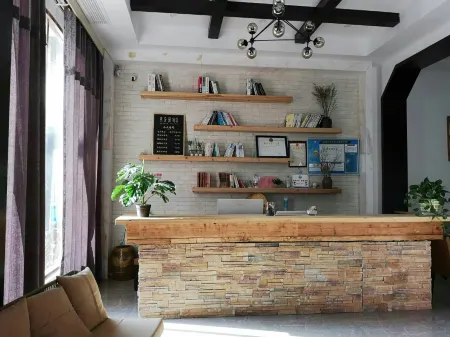 wenchenghanshexiximinsu Отели рядом с достопримечательностью «Longqiyuan»