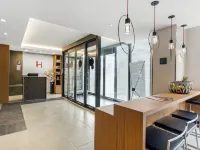 Insignia Hotel, Ascend Hotel Collection Hoteles cerca de Avenue U (línea IND Culver)
