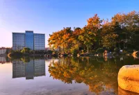 Auspicious Phoenix Hotel Отели рядом с достопримечательностью «Спортивный стадион Юябаошана»