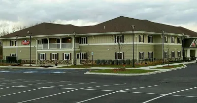 Affordable Suites Shelby Hotels near Strings Attached