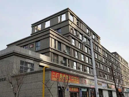 Daqing Shangjing Apartment Отели рядом с достопримечательностью «Ironman Square»