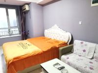 青岛自由空间度假公寓 - 浪漫大床房