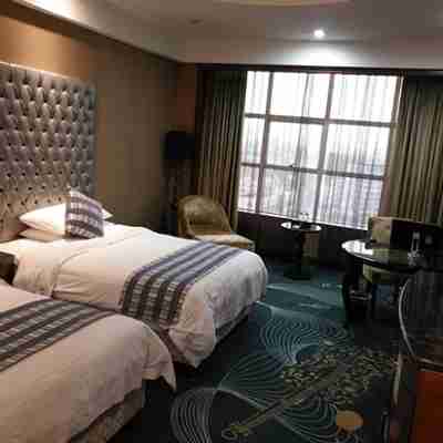 寧遠嘉爾曼酒店 Rooms