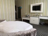 吉安金锣湾现代宾馆 - 豪华情侣圆床房
