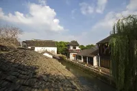 Zhouzhuang Zhengunong Inn - جاكوزي