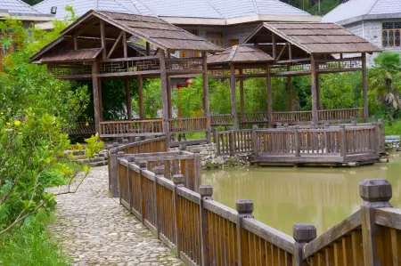 Nong Jia Shan Zhuan Отели рядом с достопримечательностью «Octagon House»
