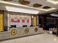 Lancang Huaqiang Business Hotel