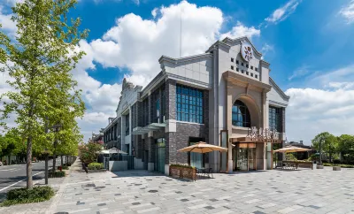 Shanghai Hongqiao Xiadu Town Manxin Hotel Отели рядом с достопримечательностью «Калькутный Резервный Центр»