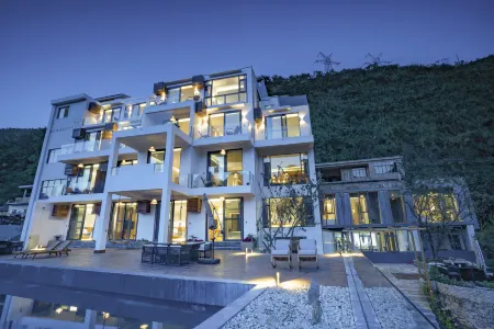 Qingshan Boutique Hostel Отели рядом с достопримечательностью «Balinghe Bridge»