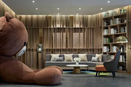 Xike Hotel (Central Hospital East Hospital Pingqiao Century Plaza Branch) Отели рядом со станцией Xinyang East Railway Station