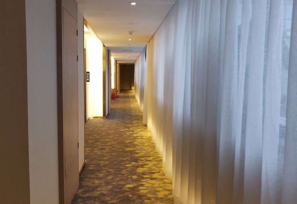 바이성 루이두오 호텔의 깔끔하고 넓은 객실 사진