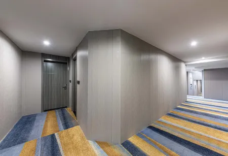 Jichu Hotel (Rongcheng Jianli No.1 Middle School Store) Отели рядом с достопримечательностью «Zhongbai Jianli Shopping Center»