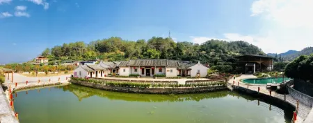 Waipojia Renshouzhuang Weilongwu Hostel Отели рядом с достопримечательностью «Yearning Tea Plantation Tourist Attraction»