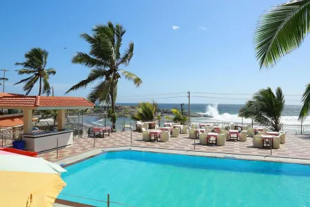 Hotel Sea Face Отели рядом с достопримечательностью «Chowara Beach»