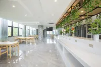 Mujiangnan Hotel (Zhenjiang Danyang Yida Plaza)