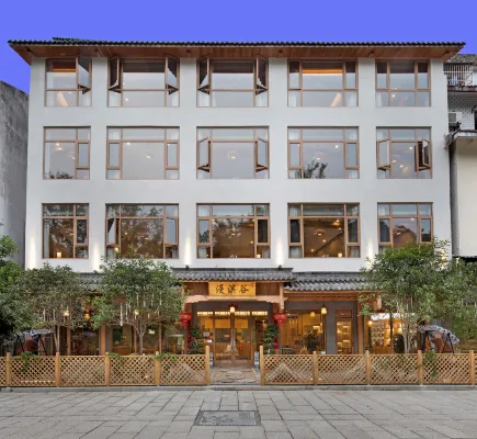 Manqigu Hotel - Inns