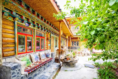 Daocheng Sanmao Homestay Отели в г. Даочжен