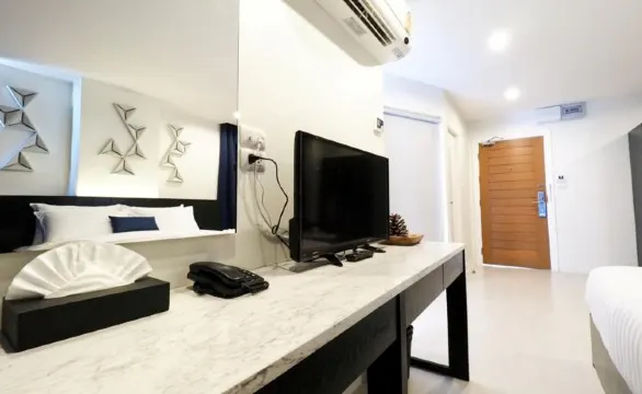 ห้องดีลักซ์ เตียงใหญ่ 1 เตียง