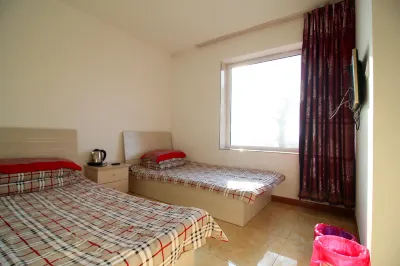 Jiangbian Renjia Sheying Jidi Inn Hotel a Jilin Wusong Island