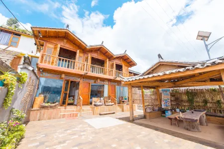 Lugu Lake Bushi Hai Seascape Inn Отели рядом с достопримечательностью «Modai Wangfeifu»