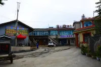 Red Clay People's Hotel Hotel di Distrik Dongchuan