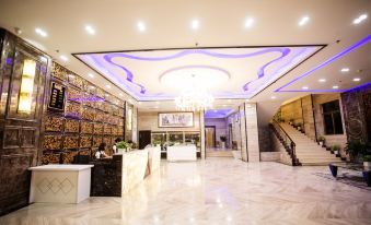 Caiyuan Boutique Hotel (Haikou High-speed Railway East Station North-South Fruit  Store)