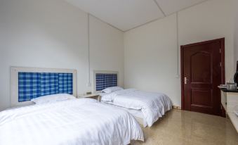 Xiaoqikong Yijiaxin Inn