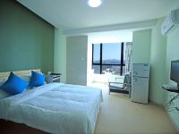 旅家度假公寓(三亚湾店) - 高级园景大床房