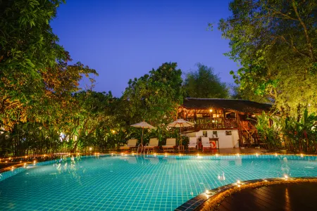 Mango T. Villa Chiang Mai Resort Отели рядом с достопримечательностью «Wat Don Chan»