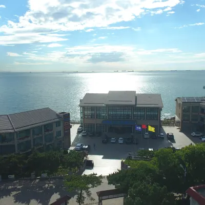 北華園觀海酒店（北戴河鴿子窩碧螺塔店） 鄰近北戴河碧螺塔海上酒吧公園的酒店