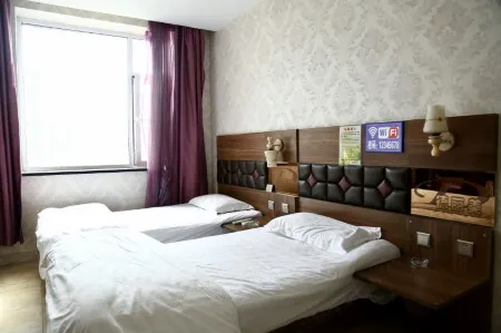 Deli Business Hotel Отели рядом с достопримечательностью «Baicheng Library»