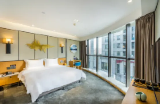 โรงแรมซินยี่ หางโจว (สาขาสถานีรถไฟฟ้ามหาวิทยาลัยการแพทย์แผนจีน) โรงแรมในเขตปินเจียง