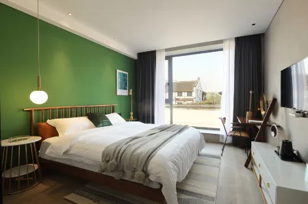 Wuzhen Xizha Shiyu Designer Homestay Отели рядом с достопримечательностью «Wu Village»