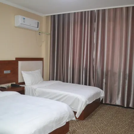 Xihua Qicai Xianggelila Business Hotel