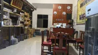 Mengla Yijia Hotel