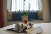 Buttonwood Fashion Hotel