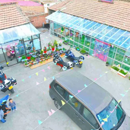 Shili Chunfeng Youcaihua Inn