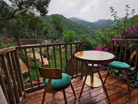 Nuodeng Nuoyan Bieyuan Garden Hotel Отели в г. Юньлун