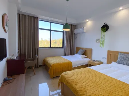 Xiuning Xixuan Inn Отели рядом с достопримечательностью «Zuyuancun»