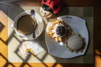 Jinbo Hotel (Chama Ancient City) - petit déjeuner