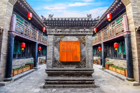 Elsewhere hotel（Inn West gate） Отели рядом с достопримечательностью «Ming and Qing Dynasty Ancient Street»