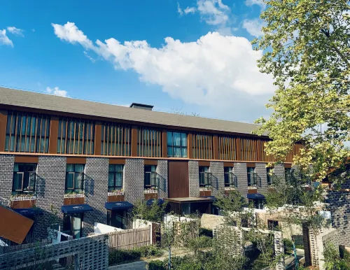 Shuimo Nianhua Hot Spring Hostel - Bungalows