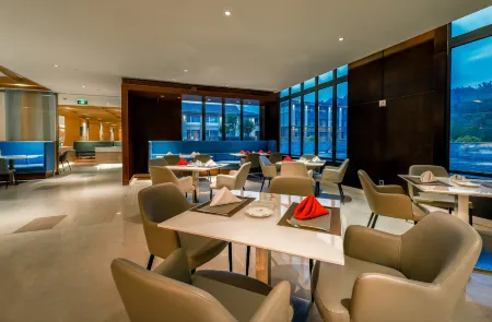 Libo Xiaoqikong Kew Green Hotel Отели рядом с достопримечательностью «Laya Waterfall»