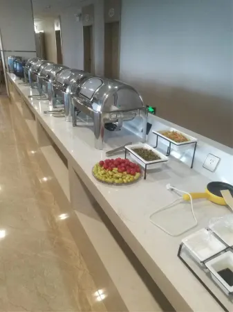 Junlai Hotel(Xinyang Railway Station Branch) Отели рядом со станцией Xinyang East Railway Station