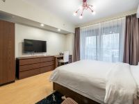 星逸公寓(成都火车东站绿地468概念店) - 露台风情大床房