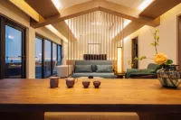 Jiuqi Haishang Taoyuanli Hotel