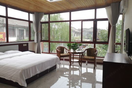 1前出发去滦州古城玩,临时攻略住宿,选中了水月湾客栈,预订了豪华河景